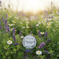 2 oz Whipped Tallow Balm in natural outdoor setting with lavender and chamomile